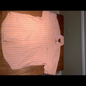 Polo short sleeve button down. Worn twice.